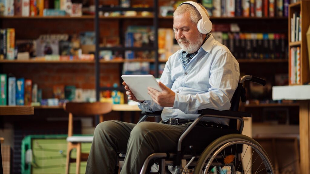 image showing a man listening to music in the office of a music therapist